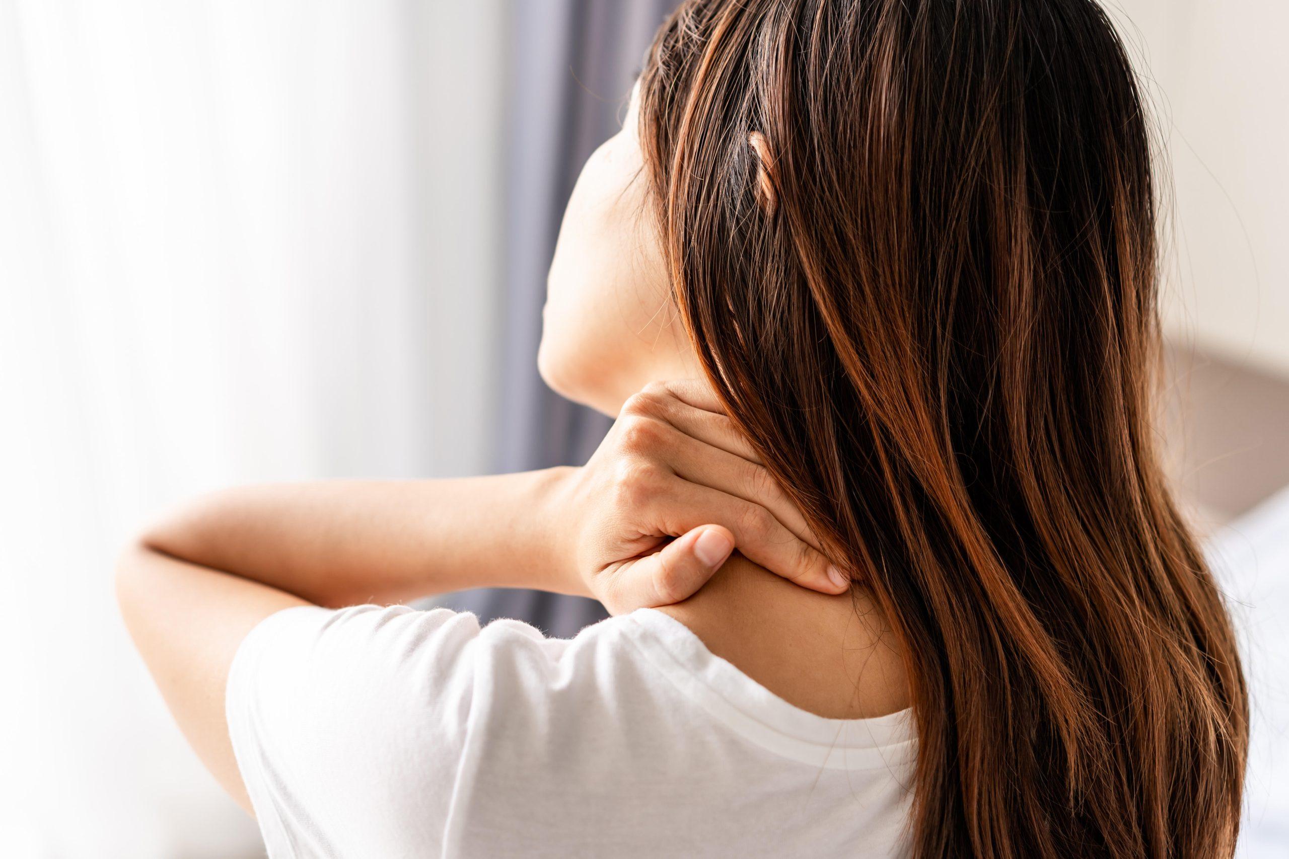 woman-suffering-from-neck-pain-on-the-bed-healthc-2026-01-08-08-23-08-utc copy