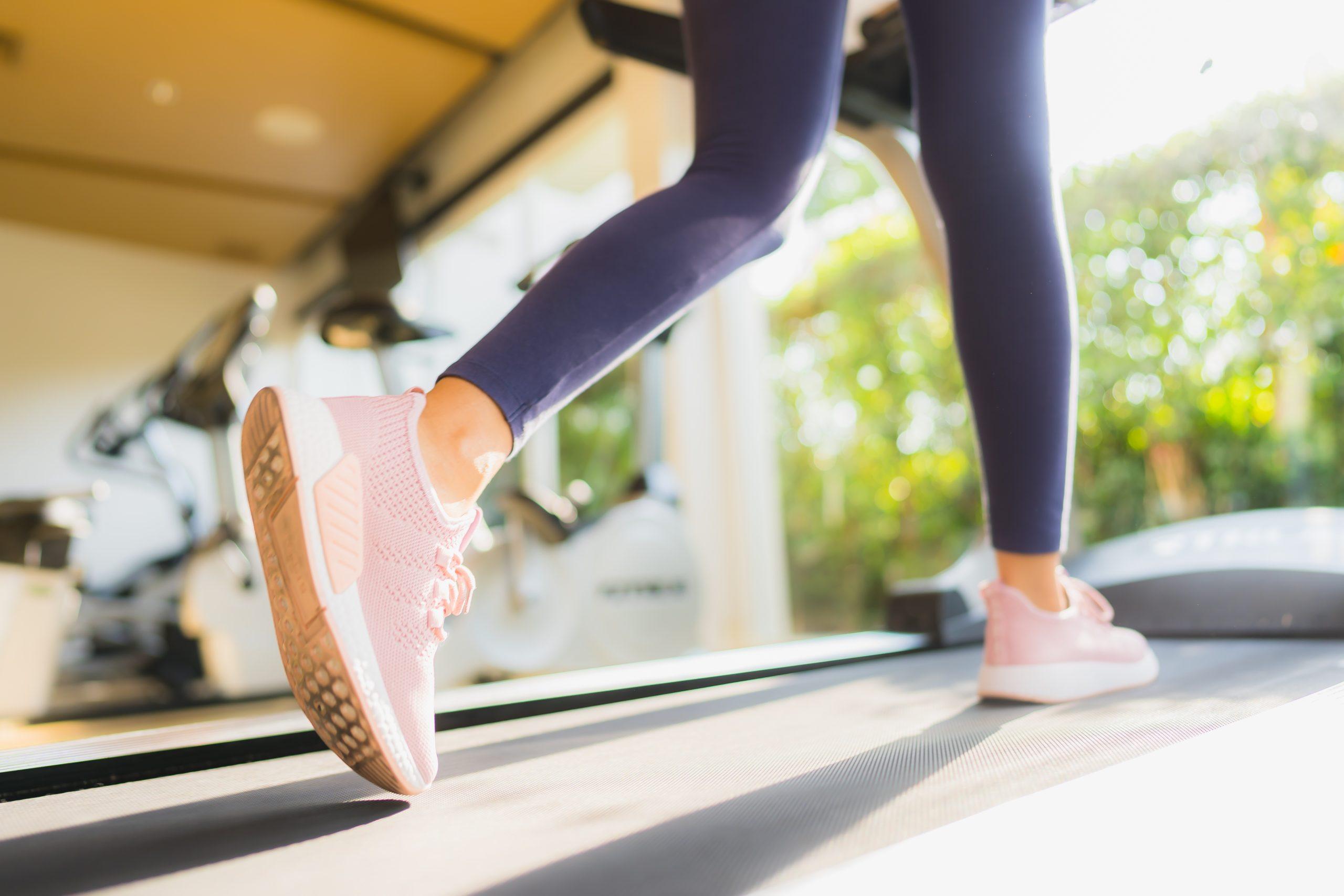 Portrait asian woman exercising and workout by running in gym for healthy